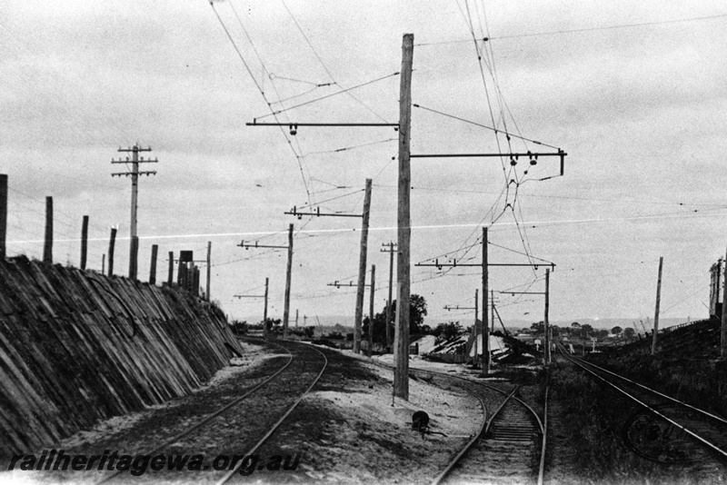 P01959
Line from East Perth to the East Perth Power station, view shows the overhead catenary, looking east.
