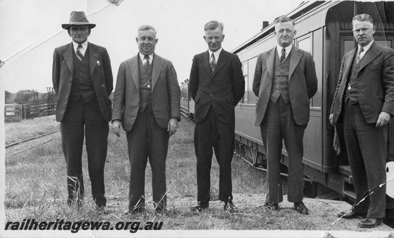 P01973
Five railway officials on the Railway Commissioner's Inspection Tour on the Miling Branch, CM line, S. Devine, A. Gilmour, I. F. Tomlinson, P. C. Raynor and O. M. Watson
