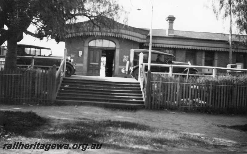 P02020
Station building, Guildford, view od steps up to the StreetSide entrance, period cars parked in front of the building, c1926
