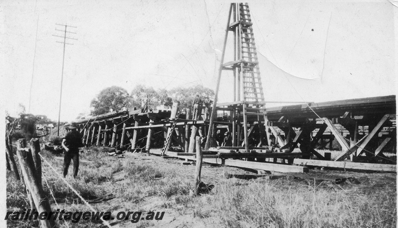 P02058
Trestle bridge, pile driving derrick, bridge under construction, view along the bridge, possibly Guildford
