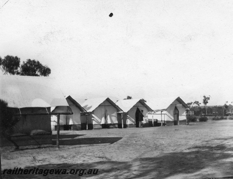 P02101
22 of 44 views of the construction of the railway at Esperance, CE line taken by Cedric Stewart, the resident WAGR engineer, line of worker's tents
