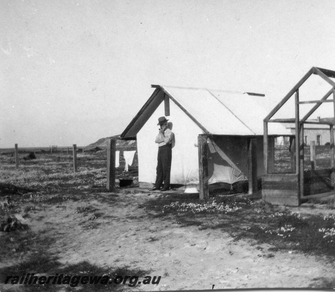 P02106
27 of 44 views of the construction of the railway at Esperance, CE line taken by Cedric Stewart, the resident WAGR engineer, worker's tents, one without covering.
