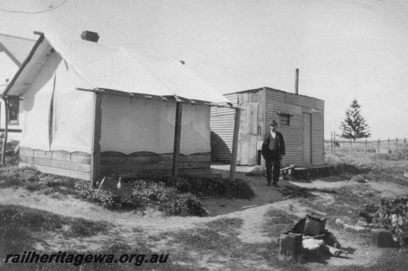 P02107
28 of 44 views of the construction of the railway at Esperance, CE line taken by Cedric Stewart, the resident WAGR engineer, worker's tent and amenities hut
