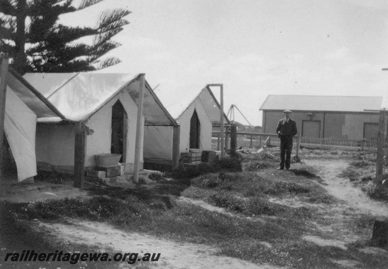 P02109
30 of 44 views of the construction of the railway at Esperance, CE line taken by Cedric Stewart, the resident WAGR engineer, worker's tents, derrick crane and goods shed in the background.
