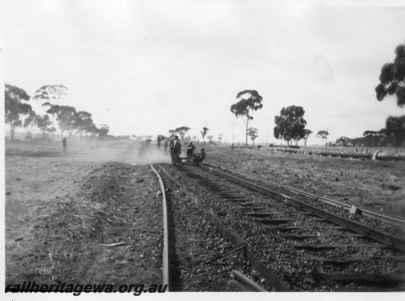 P02116
7 of 7 views of the early relaying of the track on the EGR, c1950, gangers operating a machine, view along the track
