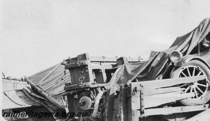 P02137
6 of 9 views of a derailment of No 26 Mixed on 26/6/1926 near Konnongorring, EM line, derailed and smashed wagons, motor vehicle on a smashed H class wagon
