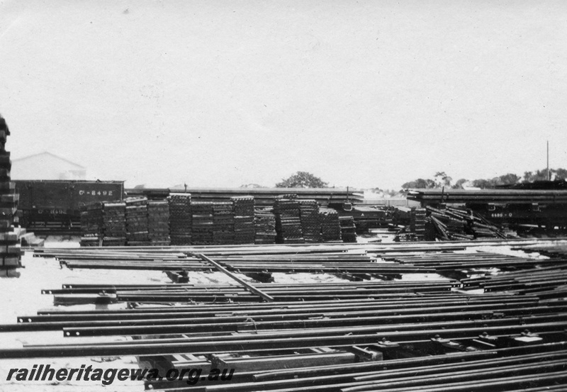 P02148
38 of 44 views of the construction of the railway at Esperance, CE line taken by Cedric Stewart, the resident WAGR engineer, stockpiles of rail and sleepers.
