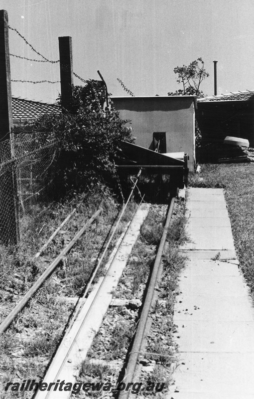 P02279
Trolley on the 26' tramway leading down to the Swan River in Rivervale, view looking up the incline to the winding shed.
