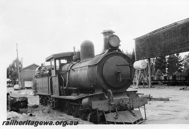 P02405
1 of 2. Ex-SAR YX Class 86, steam locomotive, side and front view, Bunning Brothers mill at Manjimup.
