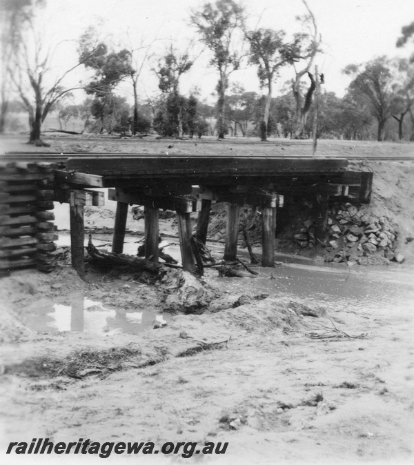 P02429
Bridge washout, pig-sty support, Kulyaling, GSR line.
