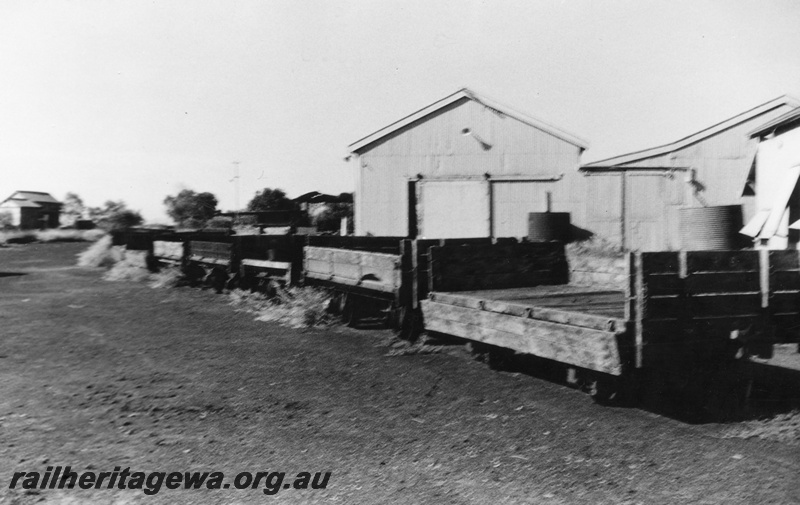 P02447
Four wheel open wagons, depot buildings, Broome
