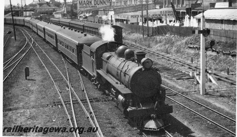 P02516
P class steam locomotive hauling a country passenger train, side and front view, Perth, ER line.
