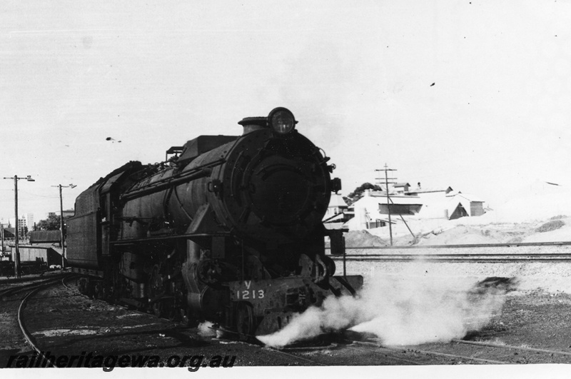 P02519
V class 1213 steam locomotive, side and front view, East Perth. ER line.
