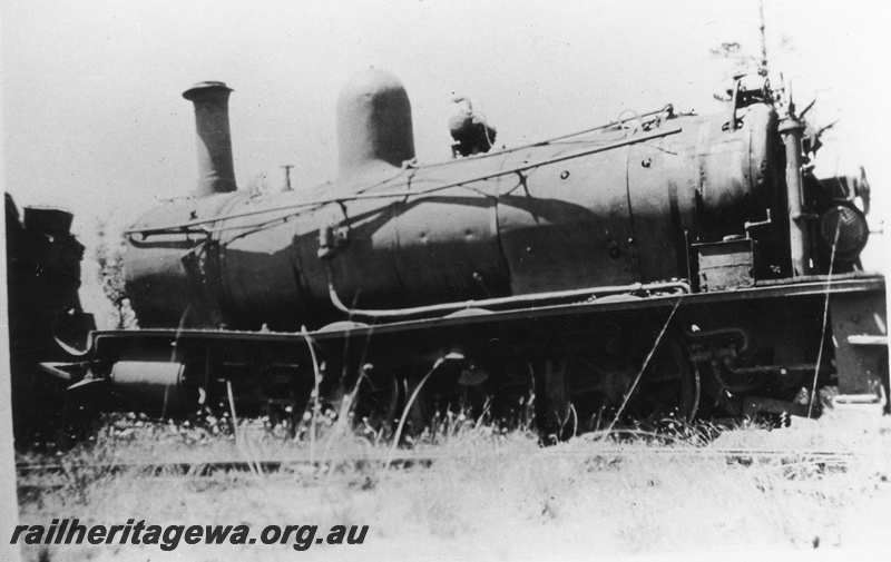 P02521
G class 125 steam locomotive after the accident on the Roelands Quarry Line Public Works Department line), side view.
