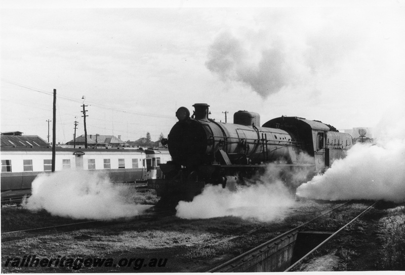 P02530
W class 920 steam locomotive, front and side view, 