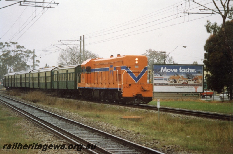 P02551
A class 1501 diesel locomotive on suburban passenger working, side and front view, Guildford, ER line.
