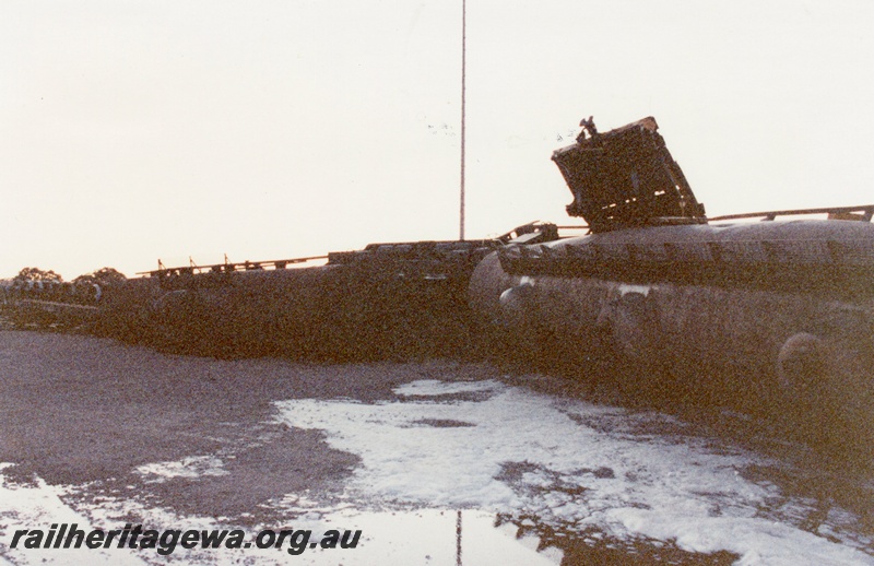 P02569
7 of 8, Tankers derailed with foam sprayed over the spillage, Forrestfield marshalling yard.
