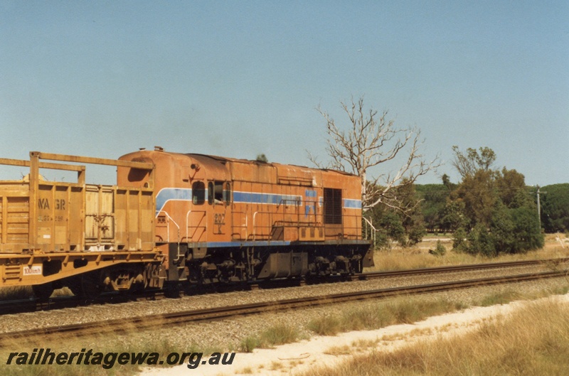 P02581
K class 207, near the Kalamunda Road overpass en route to Forrestfield, from Cobblers Pool with a special train of ballast loaded in hoppers and containers
