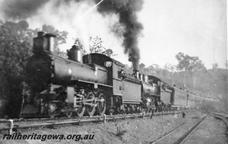 P02660
E class steam locomotive (Nasmyth Wilson and Co.) double heading E class steam locomotive (North British), Swan View, ER line, special train for turning the first sod for the Trans-Australian Railway 1913. Same as P4851
