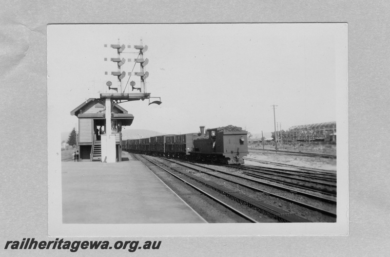 P02669
N class 260, bracket signal, signal box (B Cabin), Midland Junction, view looking east, shunting empty stock wagons.
