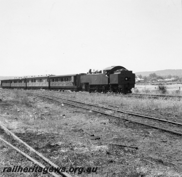 P02684
DM class steam locomotive on suburban passenger working, side and end view.
