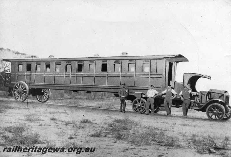 P02691
AG class carriage being transported by road to Esperance, side view.
