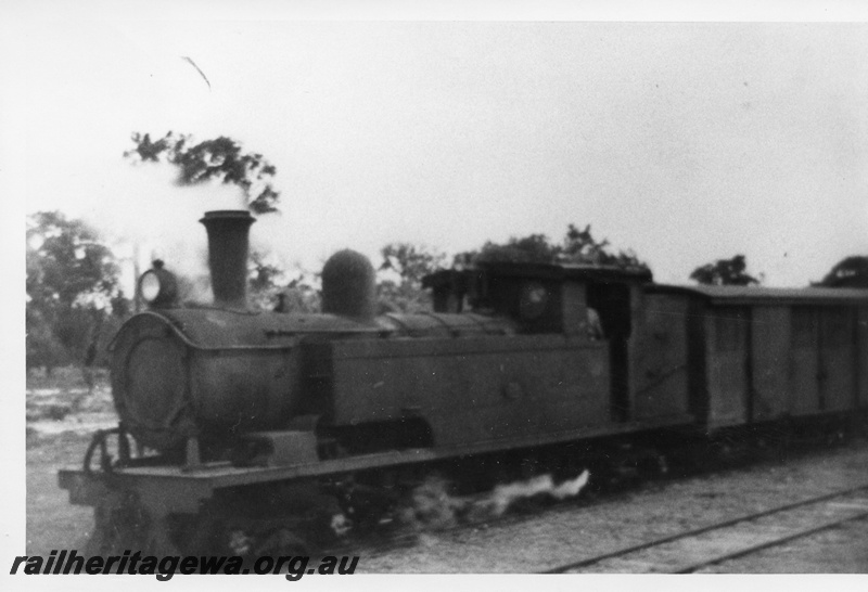 P02693
N class 72 4-4-4T steam locomotive, on goods train, front and side view, Armadale, SWR line. c1950s
