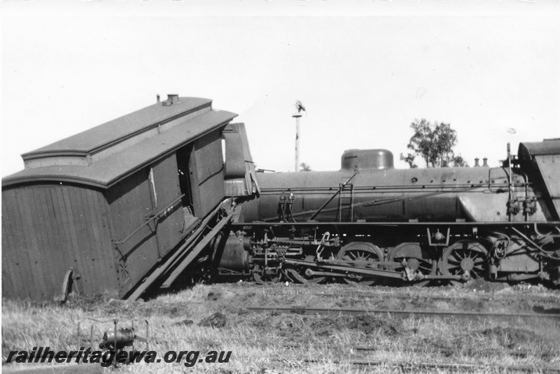 P02697
1 of 8. Rail smash, W class 951 steam locomotive, side view, derailed brakevan, Yarloop, SWR line.
