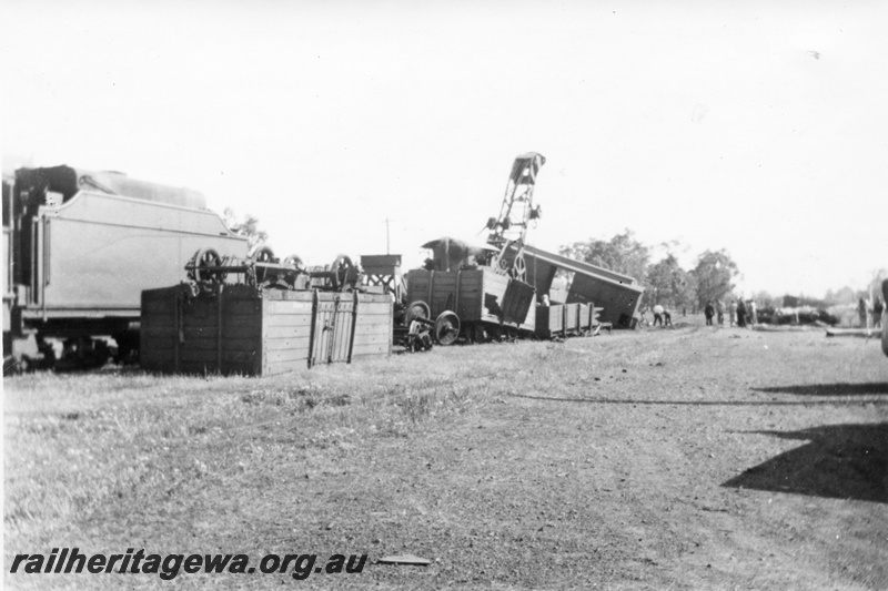 P02699
3 of 8. Rail smash wreckage at Yarloop, water tower in the background, SWR line.
