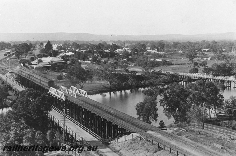 P02742
Rail and road bridges at Guildford, suburban passenger train approaching Guildford station, ER line, c1911.
