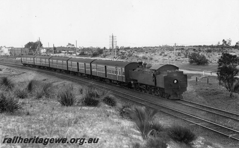 P02743
DD class 592 steam locomotive with new AY second class suburban saloon carriage and AYB first class suburban brake saloon carriages, Bassendean, ER line.
