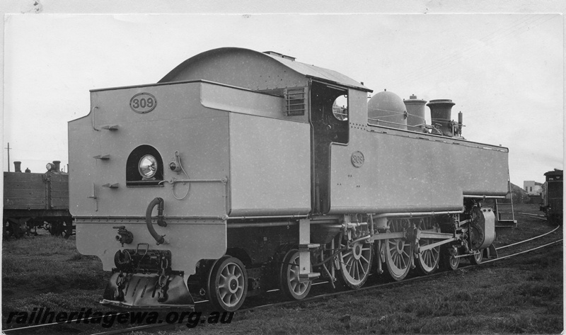 P02752
2 of 2, DM class 309 steam locomotive, end and side view, in photographic grey livery.
