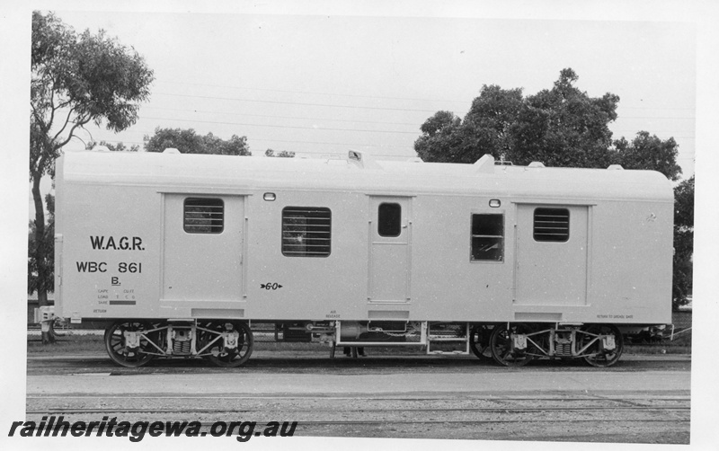 P02794
WBC class 861 standard gauge brakevan. Islington Works, South Australia, on transfer bogies, side view.
