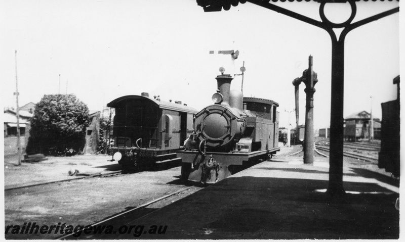 P02801
N class, platform ended brakevan, water column, Fremantle Dock, Perth Station, front and side view of the loco
