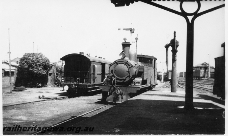 P02801
N class, platform ended brakevan, water column, Fremantle Dock, Perth Station, front and side view of the loco
