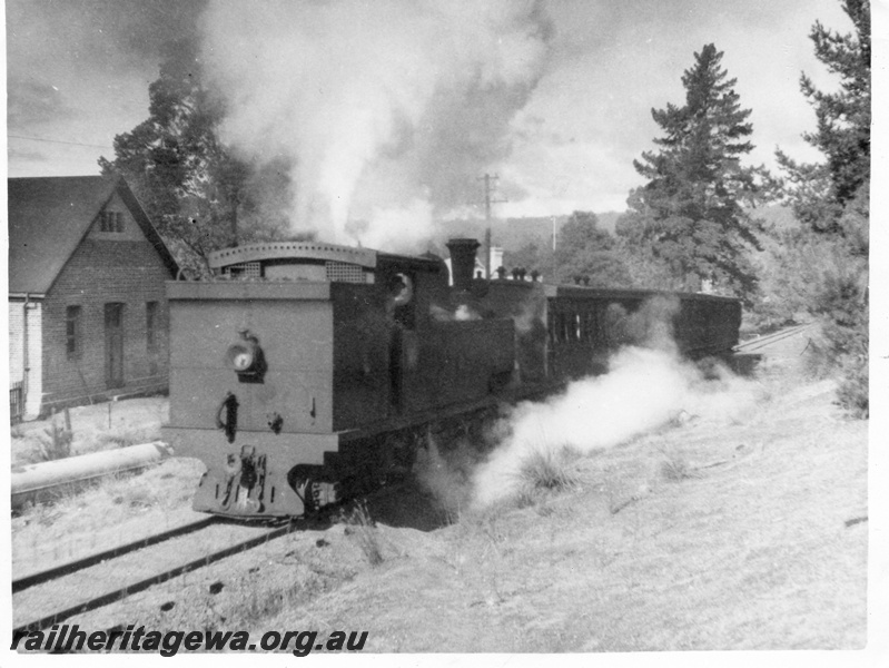 P02981
N class 26 steam locomotive on passenger train, end and side view, Karda-Mordo, MW line. Photo may be printed in reverse. Copy of negative in P3648.

