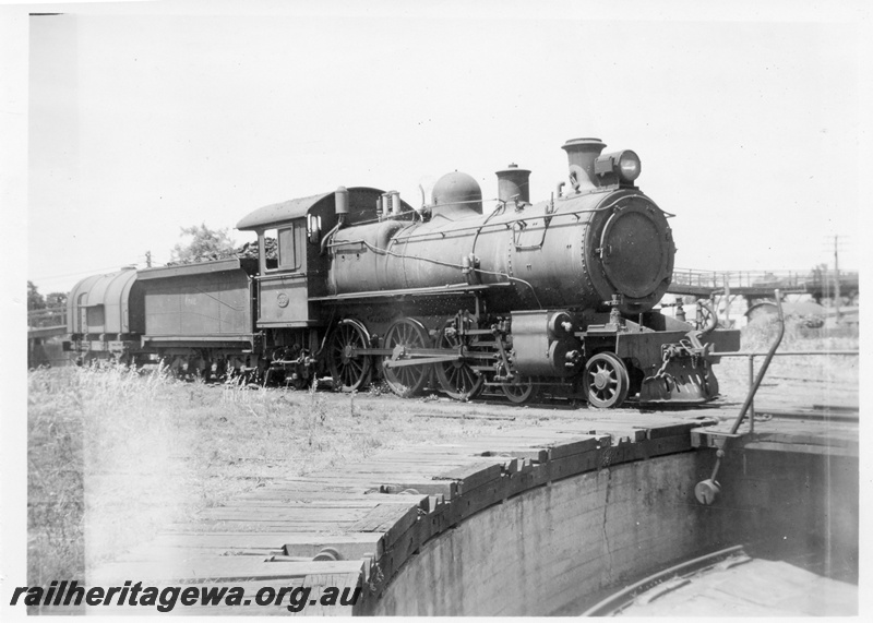 P03021
ES class 339 steam locomotive with a JA class travelling tank, approaching the turntable, side and front view, Bunbury, SWR line.
