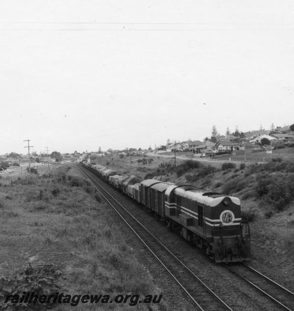 P03106
Ex MRWA G class 50, down goods, Cottesloe, ER line, in MRWA livery
