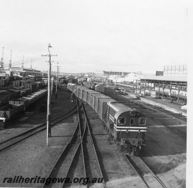 P03108
Ex MRWA F class 46, goods vans, Fremantle, ER line, shunting near port
