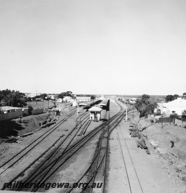 P03192
Kalgoorlie yard from Maritana St bridge, tracks, signal box, passenger platforms, signals.
