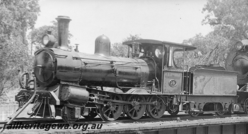 P03204
A class 10 steam locomotive on turntable, front and side view, c1943.
