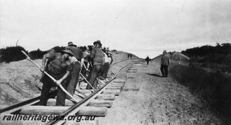P03262
Track gang working on the regrading of the line, Indarra, NR line, c1934.
