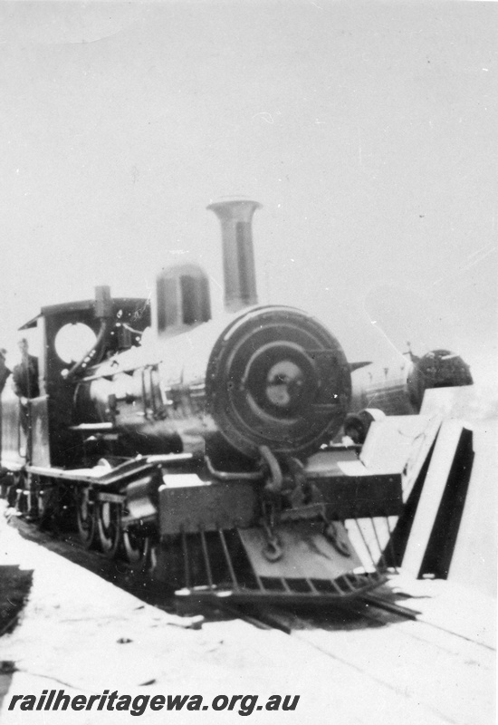 P03271
Bunning's No. 128 steam locomotive at Manjimup workshops, side and front view.
