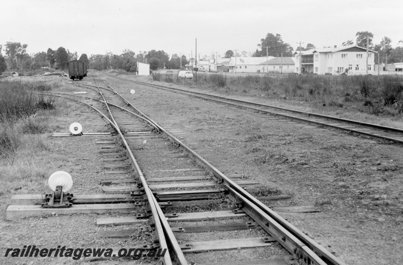 P03317
Trackwork in yard, cheese knobs, Northcliffe, PP line, view along the track, main street of Northcliffe in the background.
