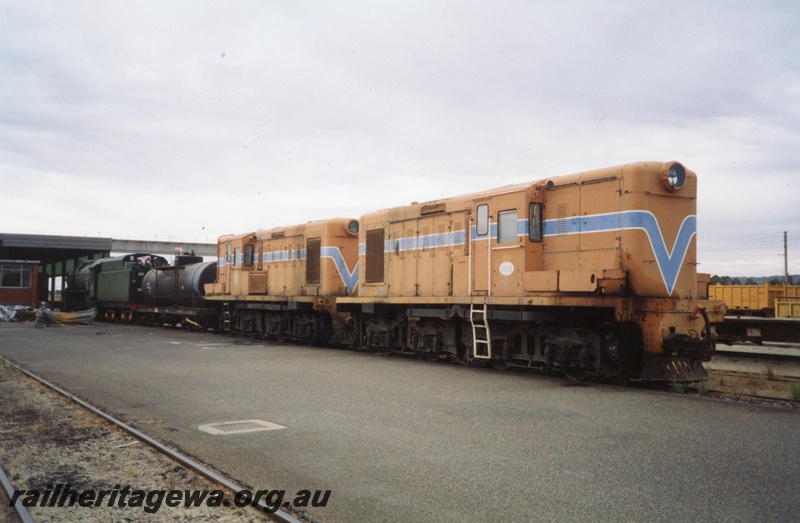 P03339
Y class 1102 and 1107 diesel shunting locomotives, V class 1213 steam locomotive and JHR class 54 tanker. All belong to Ian Willis. Forrestfield.
