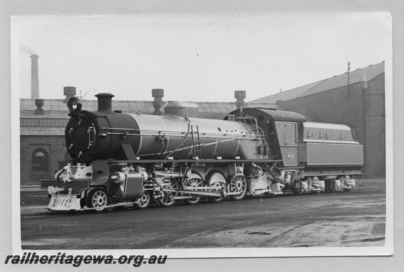 P03346
W class 903, Beyer Peacock Works, Gorton, Manchester, front and side view, loco fully lined out in photographic livery, curved front of running boards clearly visible.
