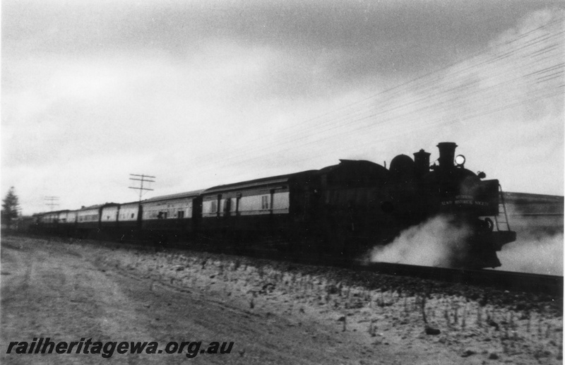 P03412
DD class 591 steam locomotive on ARHS Coastal Twilighter No.2 tour, side and front view, photo is not very clear.
