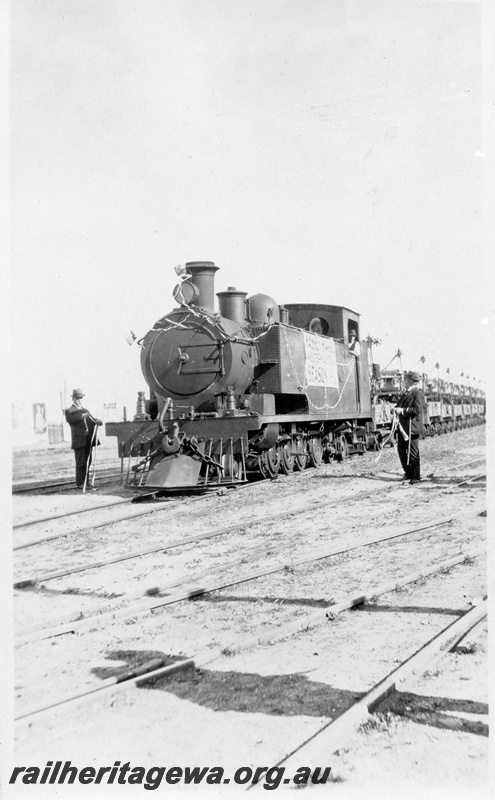 P03454
3 of 3, K class 186 steam locomotive hauling a special Massey-Harris farm machinery train, front and side view, North Fremantle, ER line.
