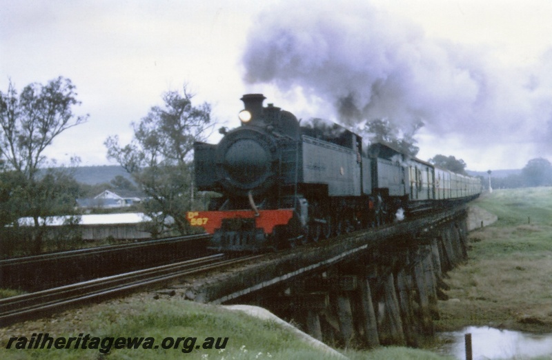 P03467
DM class double heading with DD class 592 steam locomotive on ARHS tour, on Gosnells bridge, front and side view.
