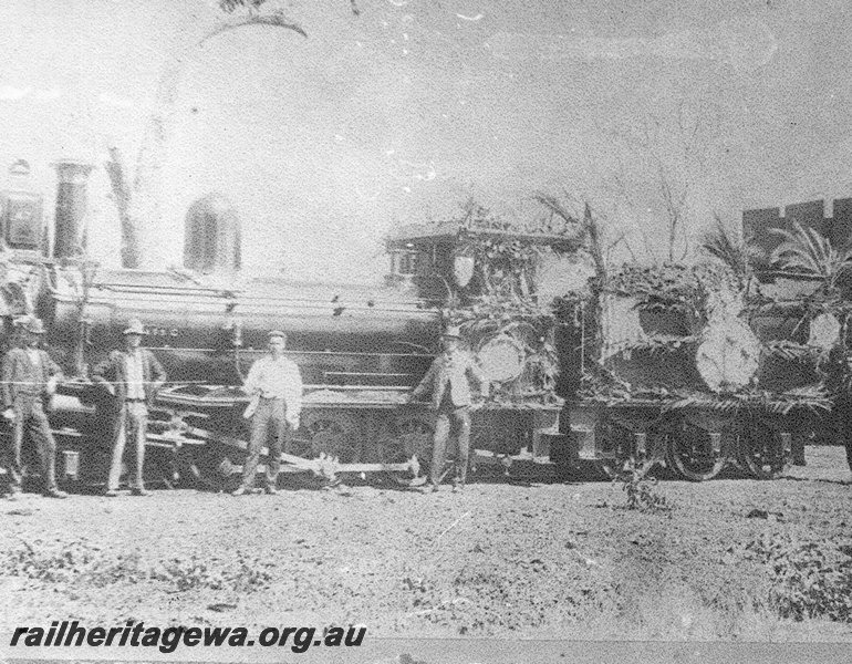 P03497
G class 47, decorated for the hauling of the Governor's special train to the Perth Racecourse, 1st Jan 1898, side view. (ref: